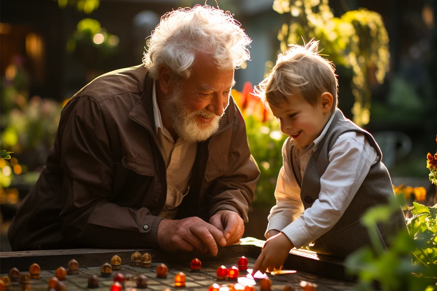 Enfants et grands-parents jouant ensemble autour de jeux en bois